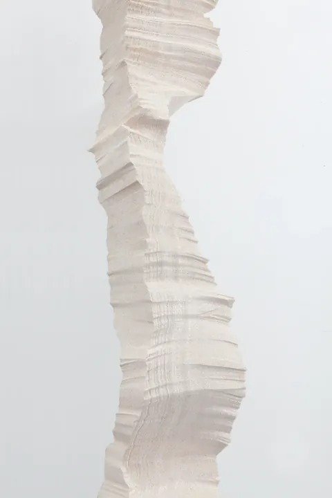 Close view of the carved polystyrene surface, cut into fine horizontal layers