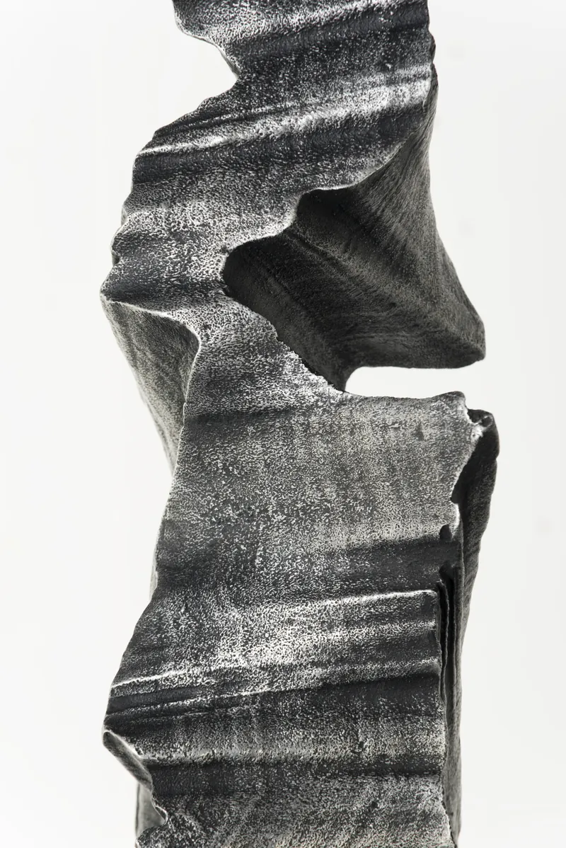 Close-up of a deep fold and hollow in the aluminium form
